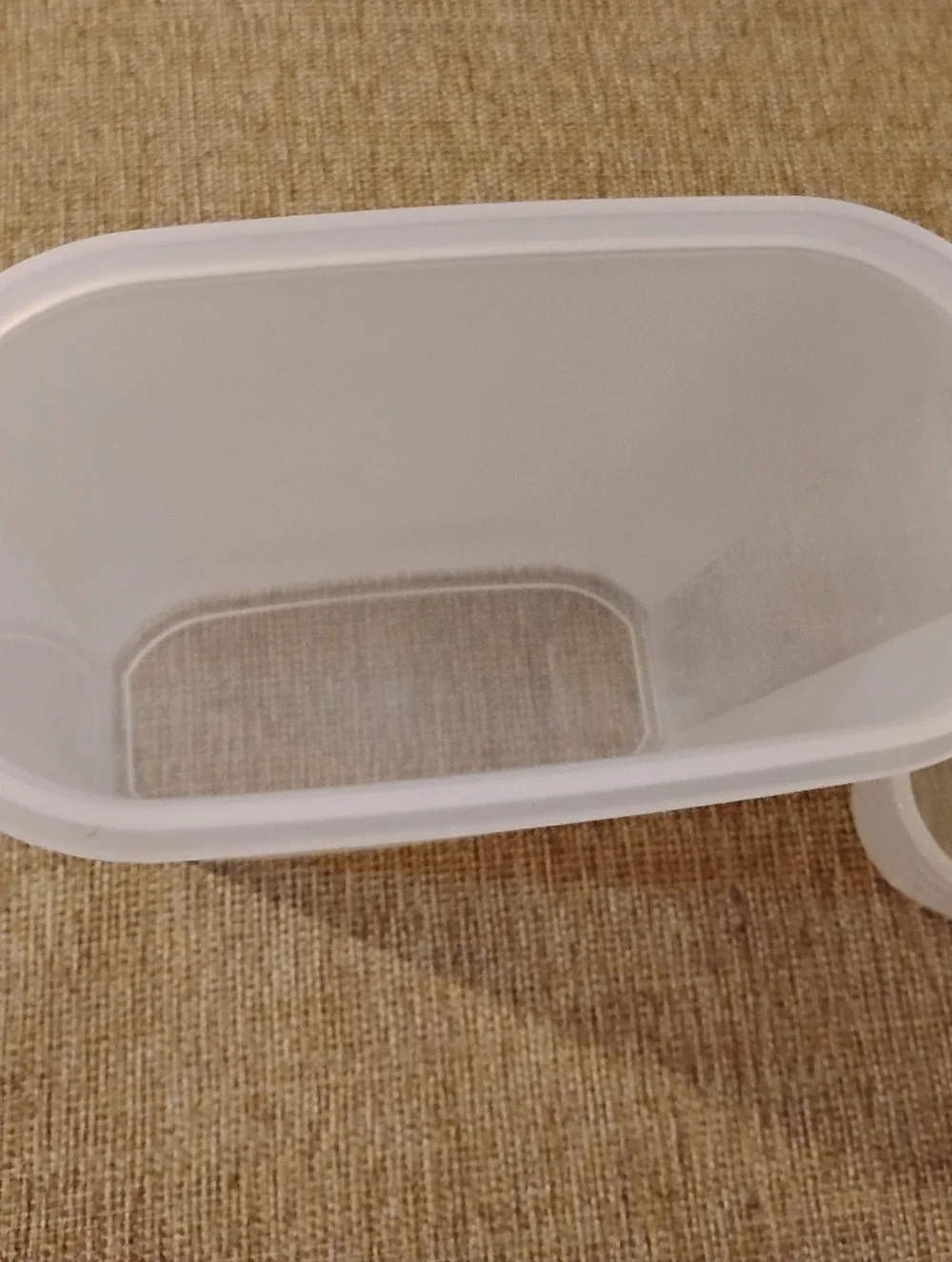 Tupperware container (2.3 litter,) , top holds 8 oz